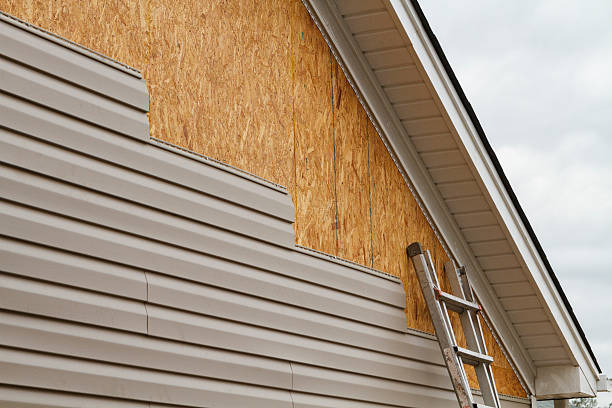 Professional Siding Installation technician working in West Milton, OH